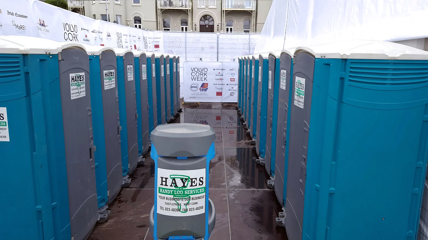 Rows of Hayes event toilets installed at Volvo Cork Week, Crosshaven